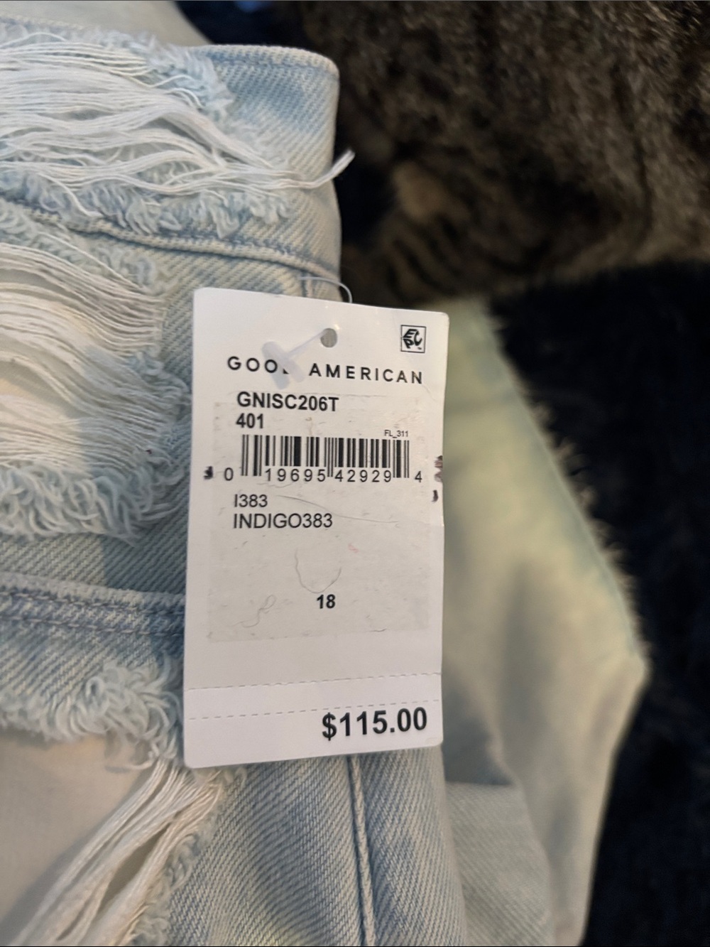 Good American Light Wash Distressed Jean Shorts with Cream Underlay - Picture 4 of 4